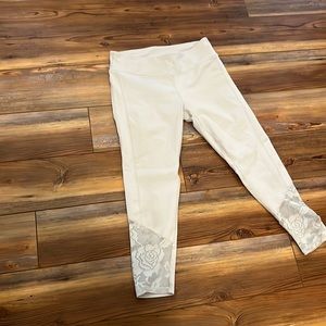 Fabletics capri legging, light grey in color, lace at bottom